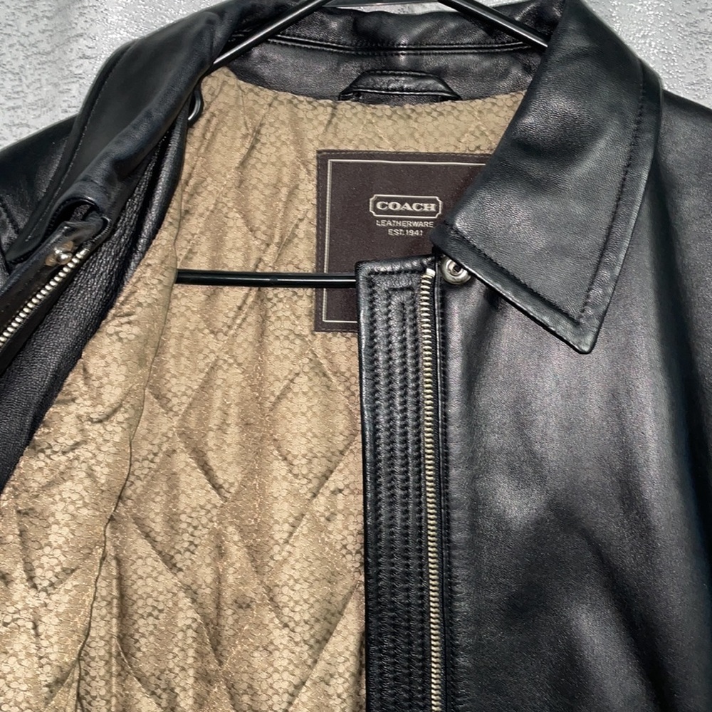 Vintage Coach black leather jacket, women’s size medium. Brown logo lining.